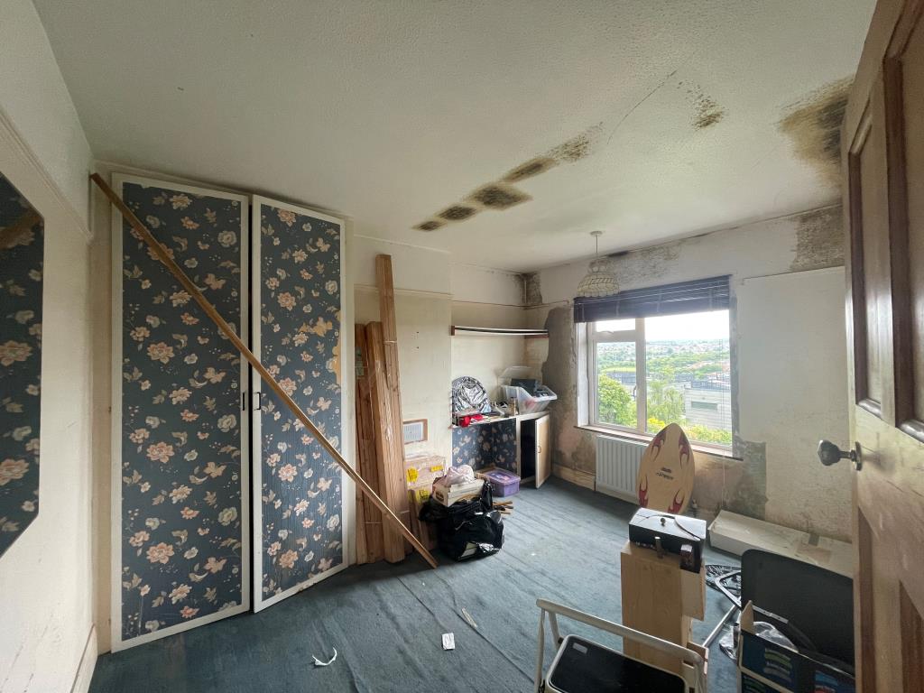 Lot: 92 - THREE-BEDROOM HOUSE FOR IMPROVEMENT - Bedroom with view to rear